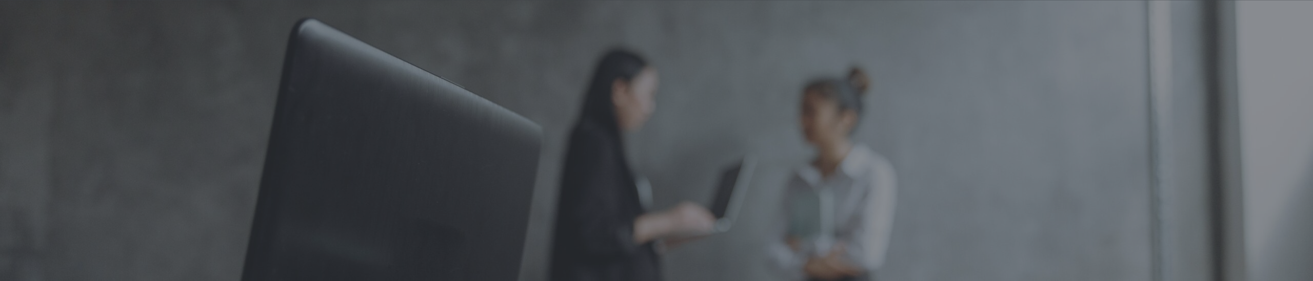 Image of 2 people talking